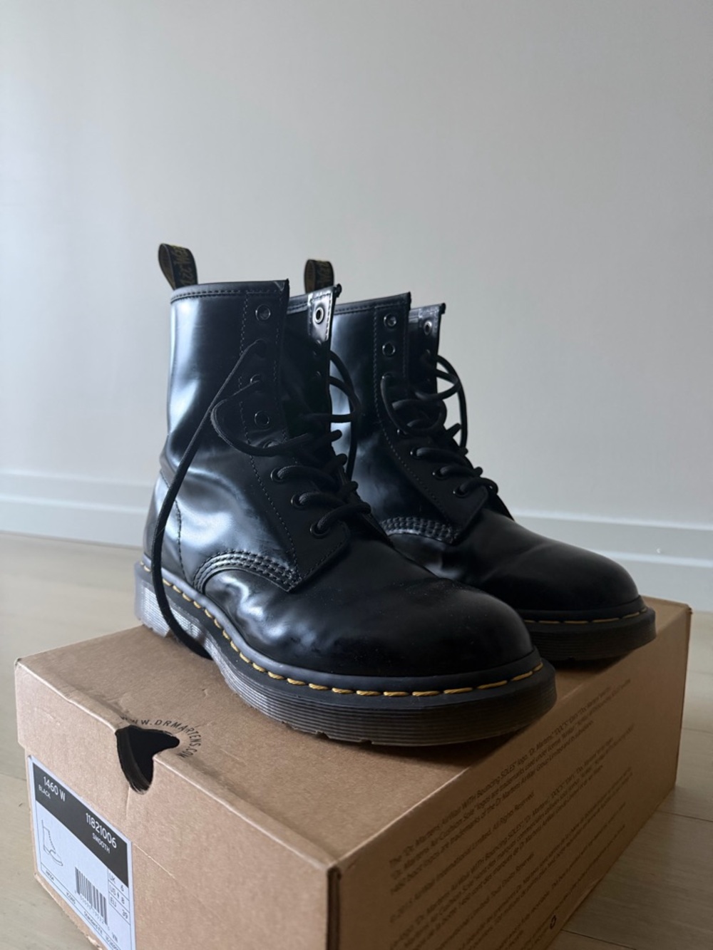 Dr. Martens Black Leather 8-Eye Lace-Up Boots with Yellow Stitching